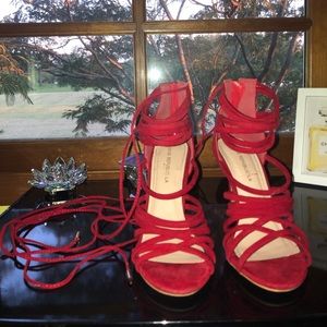 Lace up red heels